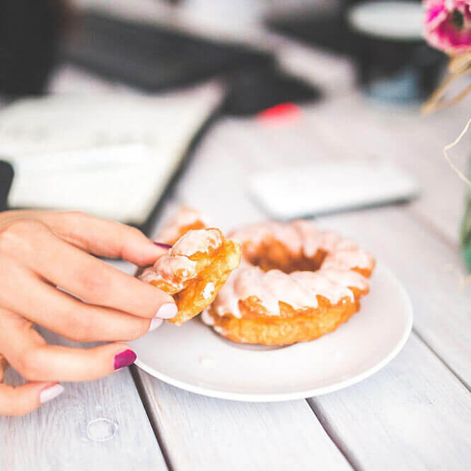 Picture of woman eating donut