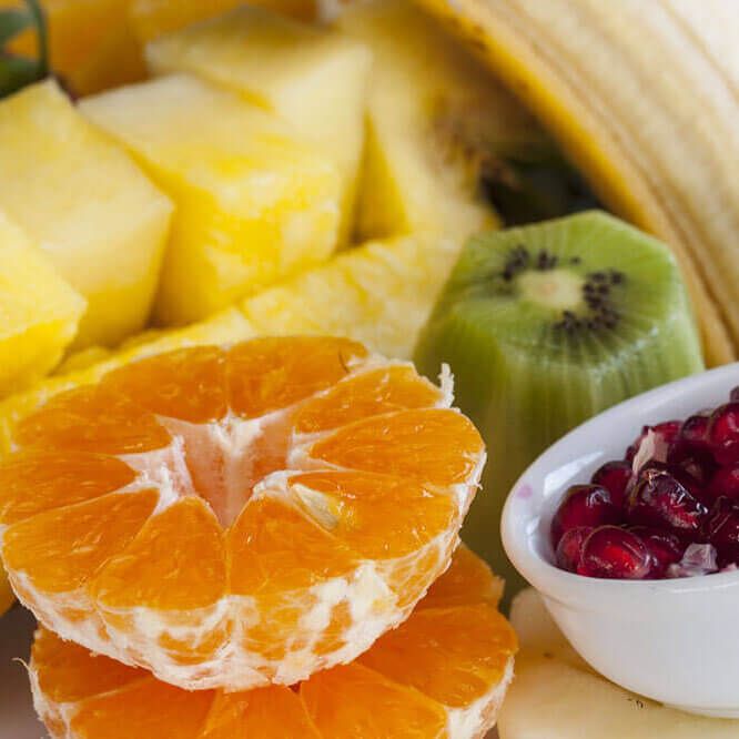 Picture of healthy fruits - kiwi, orange, pineapple, banana